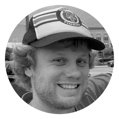 Kevin Knecht's head inside of a circle with a transparent background.